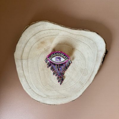 Broche oeil rose