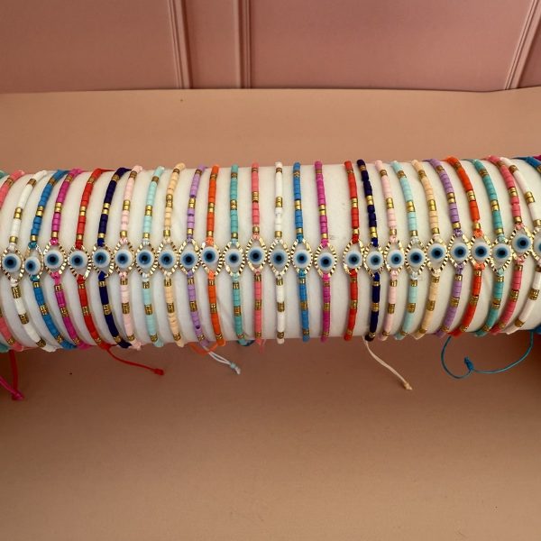 Bracelets colorés avec oeil turc et détails dorés